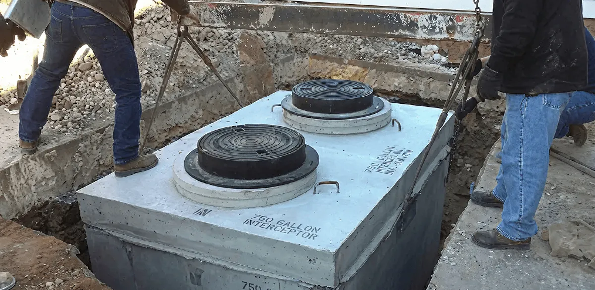 Grease trap installation for a commercial property drainage system in Green Bay, WI